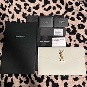 YSL UPTOWN POUCH IN GRAIN DE POUDRE EMBOSSED LEATHER ( with tags included )